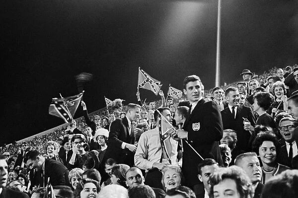 OLE MISS RIOT, 1962. Students waving Confederate flags at the University of Mississippi