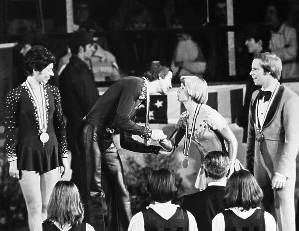 OLYMPIC GAMES, 1976. Alexander Gorshkov of the Soviet Union, winner of the gold medal, with partner Lyudmila Pakhomova (left), in the ice dancing competition at the Winter Olympic Games in Innsbruck, Austria, kisses Colleen O Connor of the United States, who has been awarded the bronze medal with partner Jim Millns (right), 9 February 1976