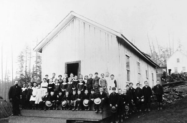 ONE-ROOM SCHOOLHOUSE. A one-room schoolhouse at Seattle, Washington, c1900