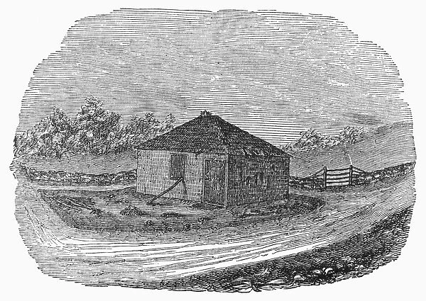 ONE-ROOM SCHOOLHOUSE. A rural schoolhouse of the early 19th century. Wood engraving, American, c1870