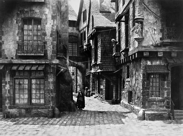 ORPHANS OF THE STORM, 1922. Paris street in D. W. Griffiths 1921 film Orphans of the Storm which takes place during the French Revolution