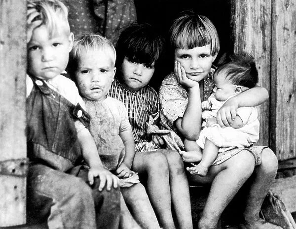 OZARK CHILDREN, 1940. Impovished children of a farmer in the Ozarks, Missouri