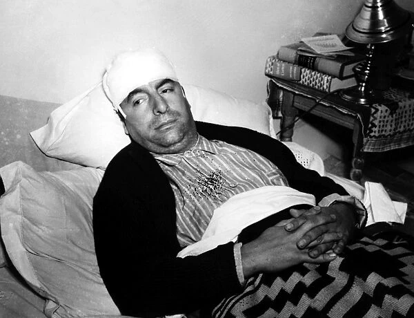 PABLO NERUDA (1904-1973). Chilean poet and diplomat. Neruda in a hospital in Mexico City after being attacked in a German restaurant for toasting President Franklin Roosevelt. Photographed 1948