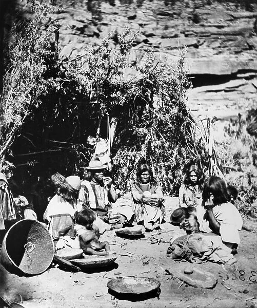 PAIUTE CAMP, c1873. The Paiute chief Chuarumpeak (center) and his family seated