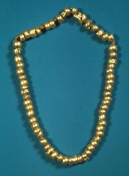 PANAMA: GOLD BEADS, c1000. Pre-Columbian gold beads from Panama, Cochle culture. c1000 A. D