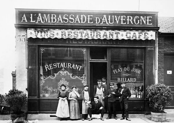 PARIS: RESTAURANT, c1900. The Auvergnats (people from Auvergne) in front of their restaurant, L Ambassade d Auvergne in Paris, France. Photograph, c1900