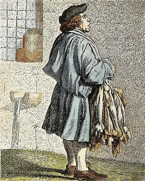 PARISIAN CRIER, c1740. A Parisian street-crier offering rabbit skins for sale: French colored engravint, c1740