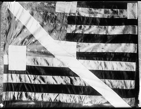 PEARYs EXPEDITION. The American flag, raised after Pearys expedition to the North Pole in 1908-09. Photograph, c1908-1919