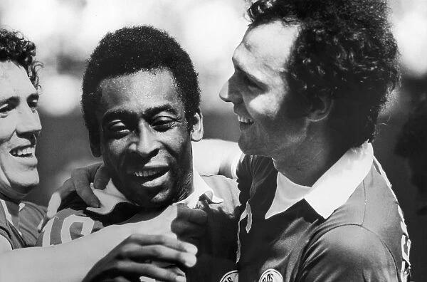 PELE & BECKENBAUER, c1977. New York Cosmos teammates Pele and Franz Beckenbauer (right). Photograph, c1977