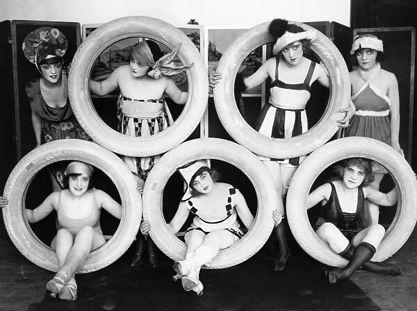 PERFORMERS, c1925. Mack Sennett girls posed with tires. Photograph, c1925