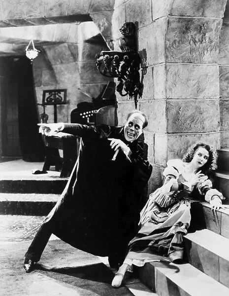 PHANTOM OF THE OPERA, 1925. Lon Chaney and Mary Philbin in a scene from the film