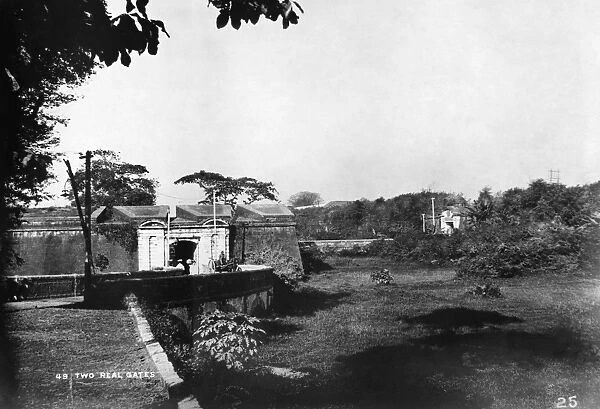 PHILIPPINES, c1900. A view of gates and a moat in Manila, the Philippines. Photograph
