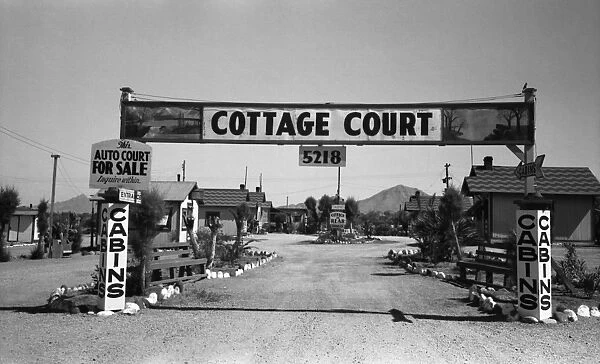 PHOENIX: COTTAGE COURT, 1940. Entrance to a motor motel for travelers, Phoenix, Arizona