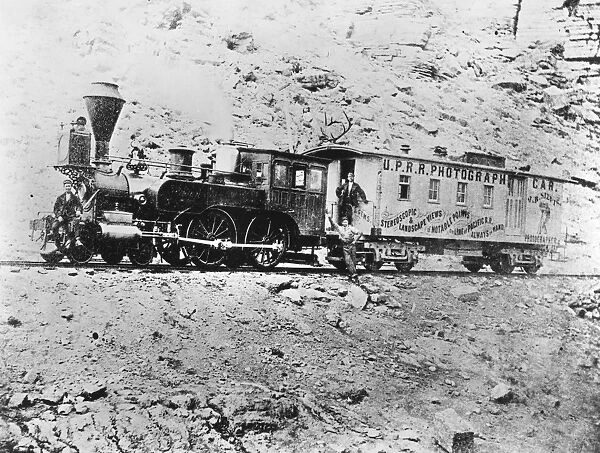 PHOTOGRAPHY RAILROAD CAR. The photography car which followed the Pacific Railroad s