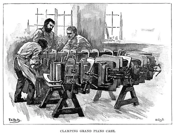 PIANO MANUFACTURE, 1901. Workers clamping a grand piano case together at a factory in England