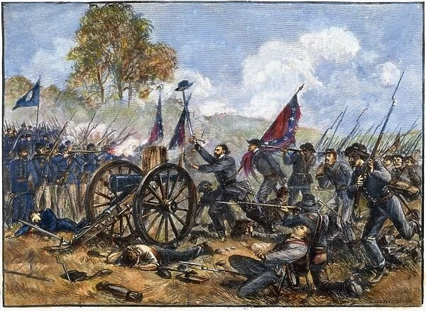 PICKETTs CHARGE, 1863. Confederate troops of Major General George E. Picketts command making their famous charge on 3 July 1863 at Gettysburg against Union positions on Cemetery Ridge: wood engraving after a drawing by A. R. Waud