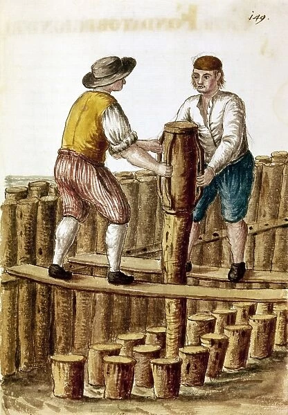 PILE DRIVERS, 18TH CENTURY. Two workers driving piles at a construction site