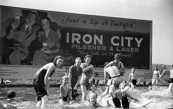 PITTSBURGH: CHILDREN, 1938. Steelworkers children swimming in a homemade pool