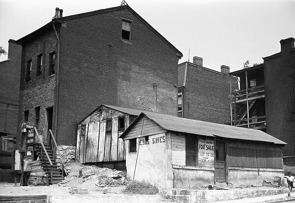 PITTSBURGH SLUM, 1938. Houses on The Hill, the slum section of Pittsburgh, Pennsylvania