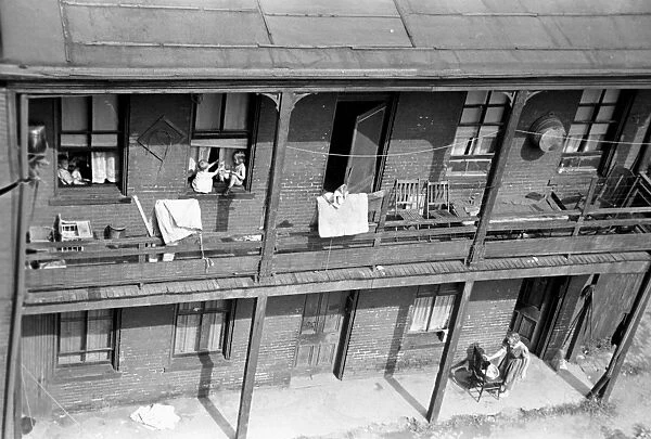 PITTSBURGH SLUM, 1938. Housing in the slum section of Pittsburgh, Pennsylvania