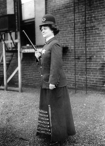 POLICEWOMAN, 1909. A suffragette posed as a female police officer in Cincinnati, Ohio. Photograph, 23 September 1909