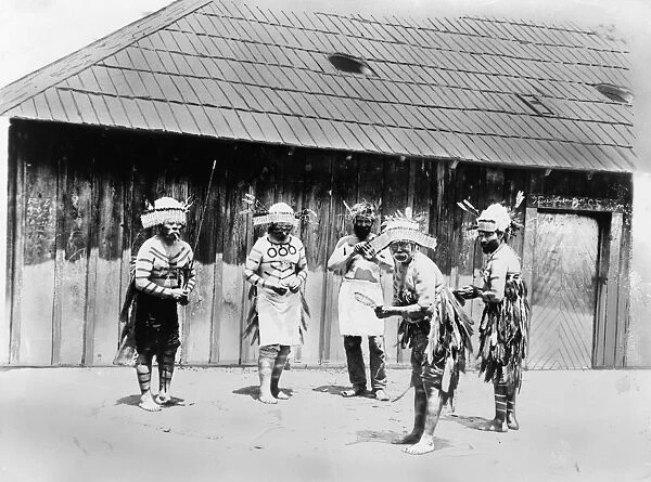 POMO DANCERS, c1941. A group of Pomo dancers in ceremonial dress, Lakeport, California