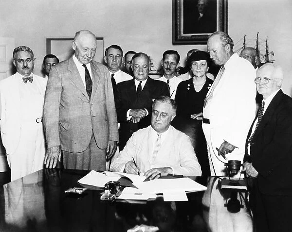 President Franklin D. Roosevelt signing the Social Security Act in the Cabinet Room of the White House, 14 August 1935. In attendance (left to right) are Congress members Frank Buck; Robert Doughton; Alben Barkley; Robert Wagner; John Dingell, Sr. ; Frances Perkins (Secretary of Labor); Pat Harrison; and David Lewis