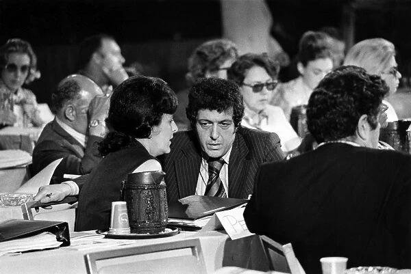PRESIDENTIAL CAMPAIGN, 1972. Attorney Stanley Bregman, a top campaign aide to former Vice President Hubert Humprhey, speaking with Marilyn Young, a delegate from Pennsylvania, at a meeting of the Credentials Committee of the Democratic National Convention in Washington, D. C. 29 June 1972