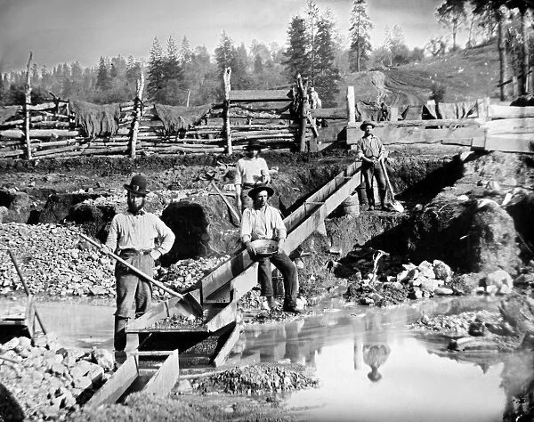 Prospectors posing at their sluice box. Daugerreotype, probably California, c1850