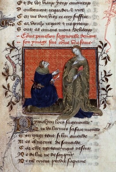PYGMALION. Pygmalion falling in love with his sculpture: French ms. illumination, c1405