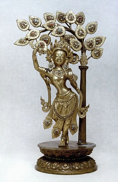 Queen Maya giving birth to Prince Siddhartha, the future Buddha. Nepal, 1825. Gilded brass