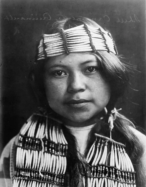 QUINAULT GIRL, c1913. Portrait of a Quinault girl from the Pacific Northwest by Edward S