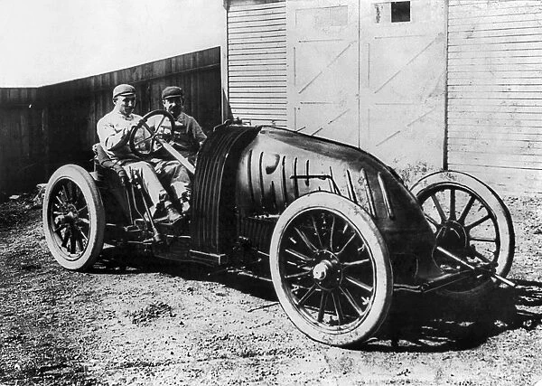 RACECAR DRIVERS, 1906. A French racecar driver and a companion photographed in