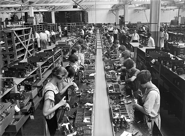 RADIO FACTORY, c1925. Young women at work in the assembly room of the Atwater Kent