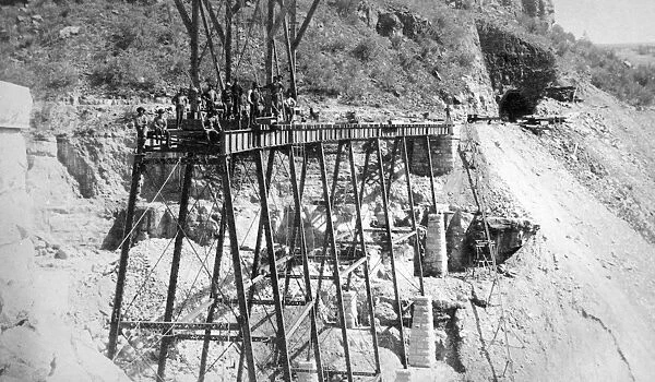 RAILROAD BRIDGE, 1890s. The tunnel and Johnsons Canon (Canyon) iron bridge under