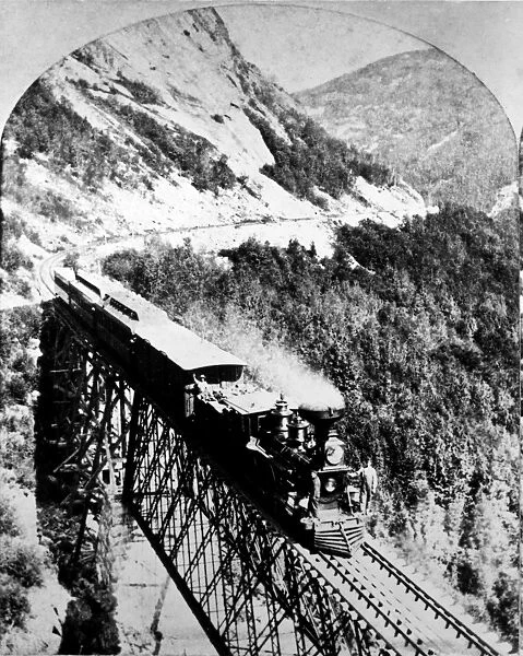 RAILROAD BRIDGE, c1870. A railroad bridge in the American west. Stereograph, c1870