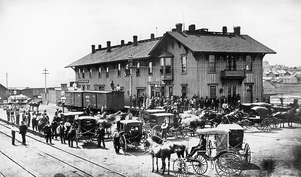 RAILROAD STATION, 1880. The Santa Fe Railroad depot at 4th and Holliday Streets in Topeka
