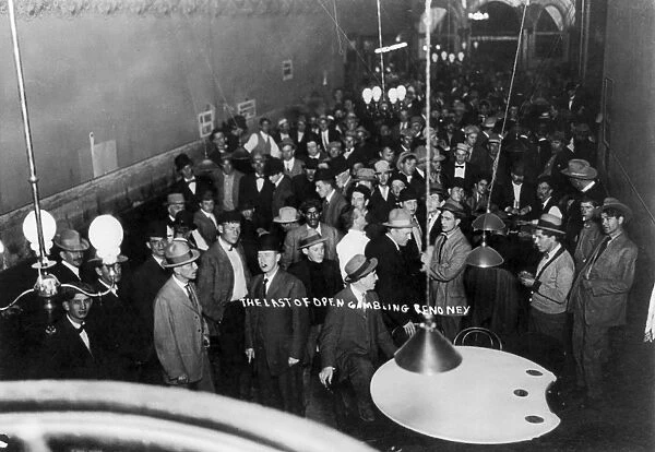 RENO: CASINO, 1910. A crowded casino in Reno, on one the last days of legal gambling