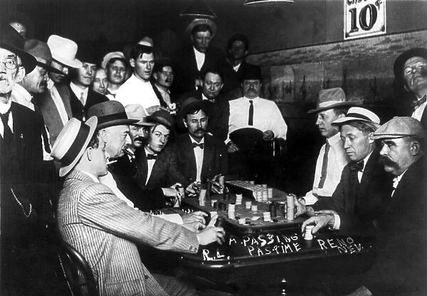RENO: GAMBLING, 1910. Spectators observing a game of faro at a casino in Reno, Nevada