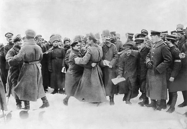 REVOLUTION OF 1917. Russian and German soldiers fraternizing after the armistice, 5 December 1917, between Russia and the Central Powers