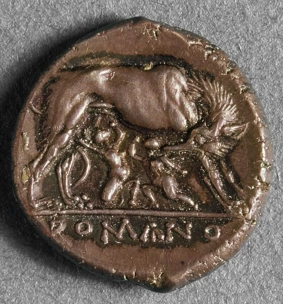 Roman coin, c260 B. C. depicting a she-wolf suckling twin infants: the legendary founder of Rome, Romulus and his brother Remus