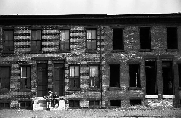 ROW HOUSE, 1938. Homes of factory workers in Camden, New Jersey. Photograph by Arthur Rothstein