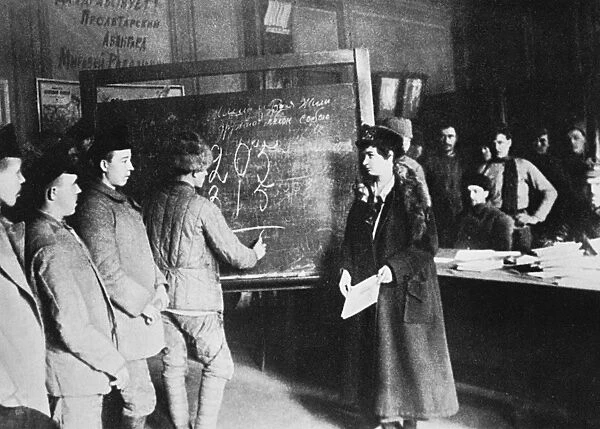 RUSSIA: STUDENTS, 1917. Workers studying at a Center for Liquidating Illiteracy sometime after the Bolshevik Revolution of 1917