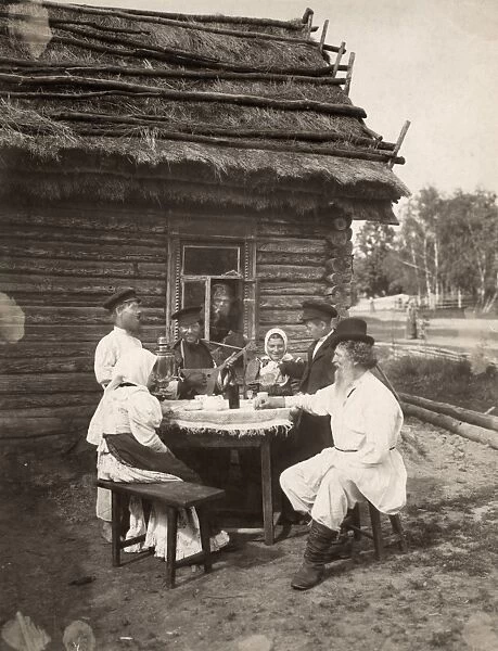 RUSSIAN FAMILY, c1875. A tableau photograph of a Russian peasant family seated