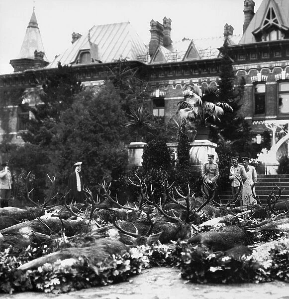 RUSSIAN HUNTING LODGE, 1912. Dead game gathered outside the imperial hunting lodge