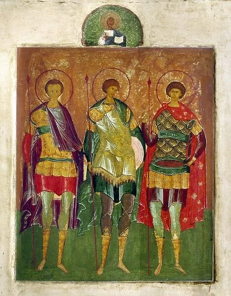 RUSSIAN ICON: SAINTS. Three warrior saints. Tempera on wood Russian Orthodox icon, made in Moscow, early 16th century