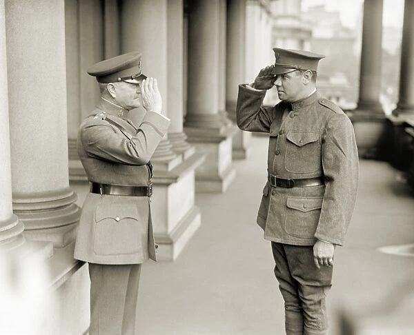 RUTH & PERSHING, 1924. American baseball player Babe Ruth (right) saluting military leader John J. Pershing, in 1924, while serving in the New York National Guard 104th Field Artillery