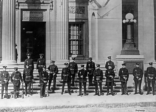 SACCO & VANZETTI, 1927. Riot squad guards outside of the courthouse in Dedham, Massachusetts