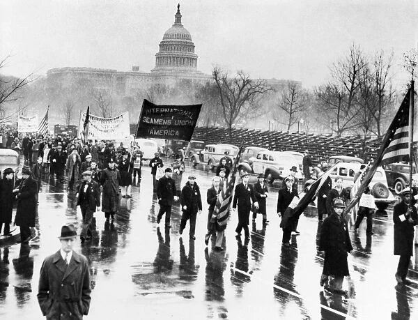 SAFETY AT SEA ACT, 1936. Striking merchant marine seamen marching in Washington, D. C. to protest the Safety at Sea Act of 1936