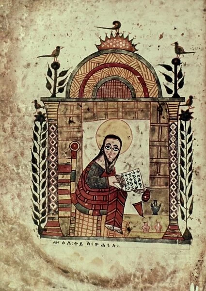 SAINT JOHN. Writing his gospel. Dabra Maryam manuscript. Ethiopia. c1360-80